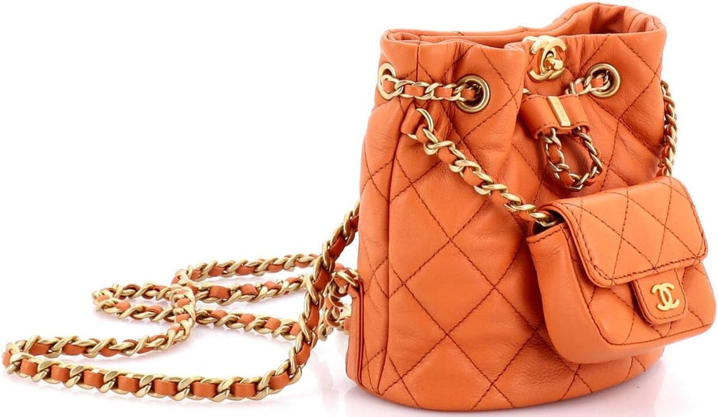 Chanel, CC Pocket Chain Bucket Backpack Quilted Lambskin Small, Orange