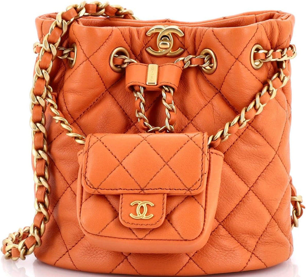 Chanel, CC Pocket Chain Bucket Backpack Quilted Lambskin Small, Orange